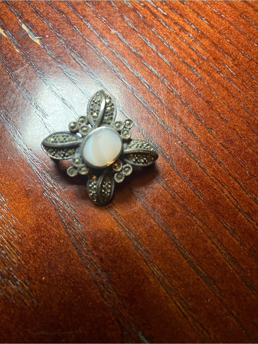 Silver-Tone Floral Brooch with White Center Cabochon